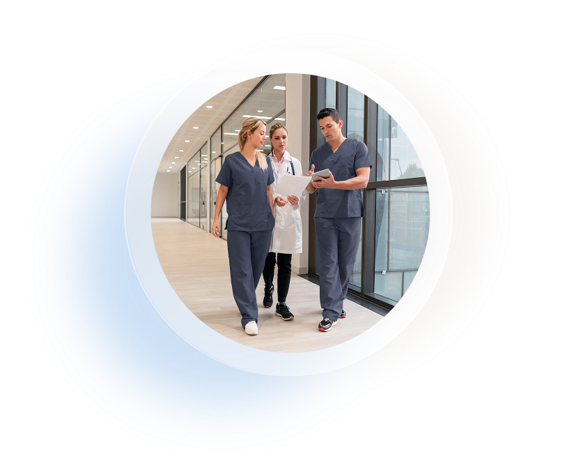 Nurses walking alongside doctors