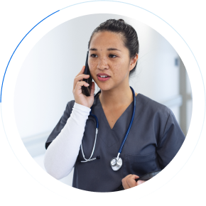 Nurse taking a call on her mobile device